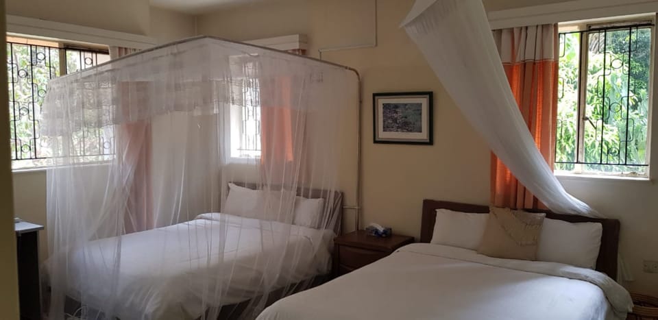 Triple Room | Premium bedding, memory foam beds, desk, free WiFi