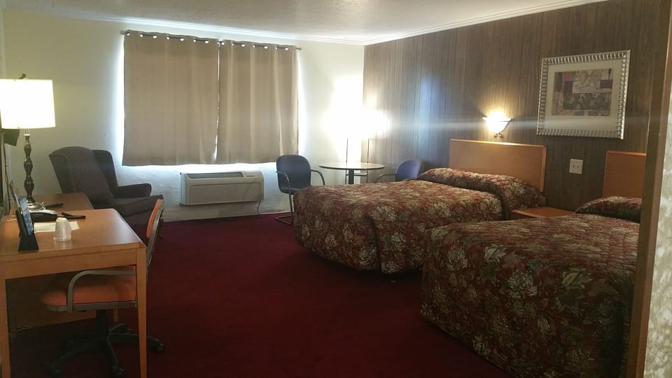 Basic Double Room, 2 Double Beds | Living area | LED TV