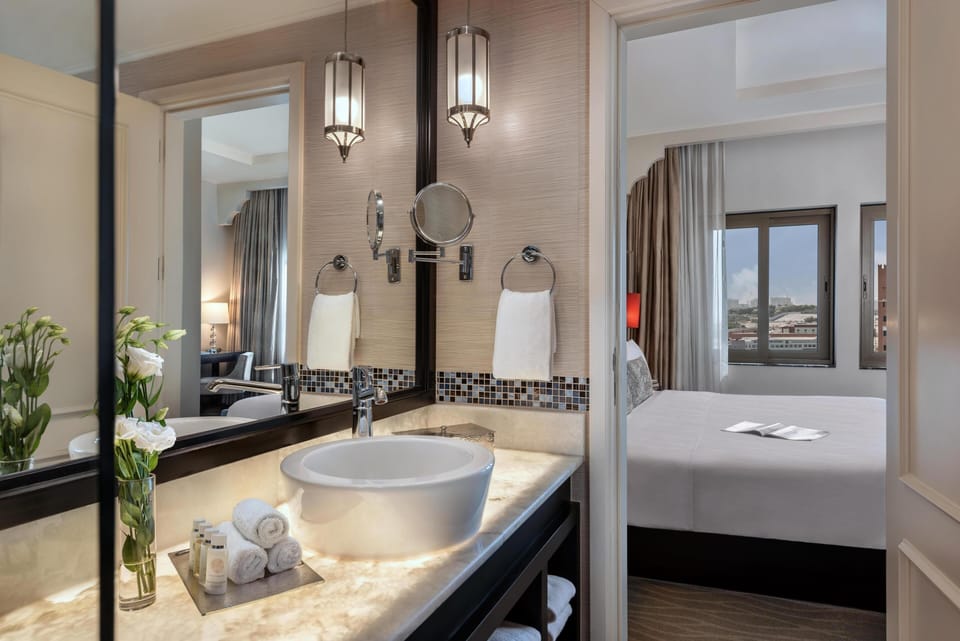 Two Bedroom Royal Suite, Evening Drinks & Canapes Section | Bathroom | Separate tub and shower, free toiletries, hair dryer, bathrobes