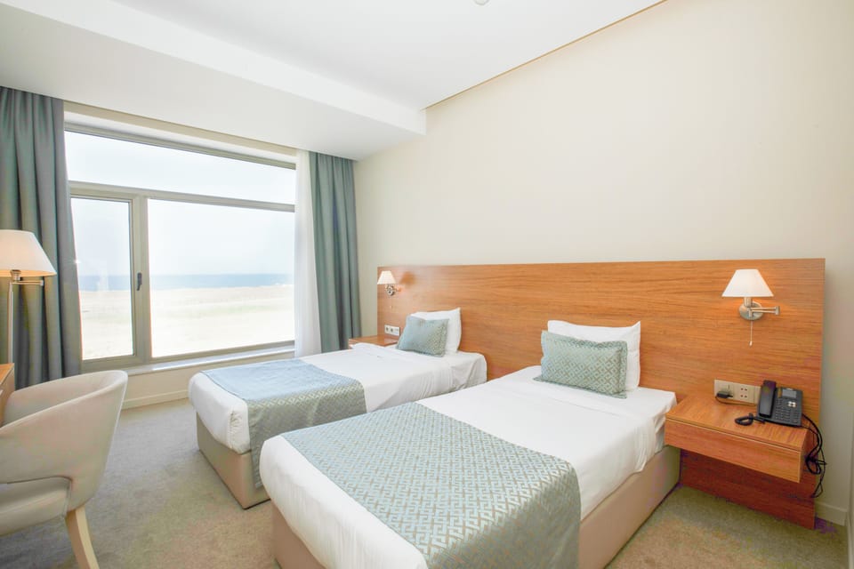 Premium bedding, minibar, in-room safe, blackout drapes