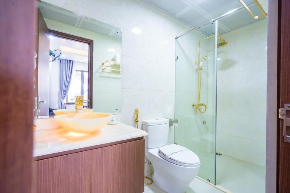 Shower, free toiletries, hair dryer, slippers