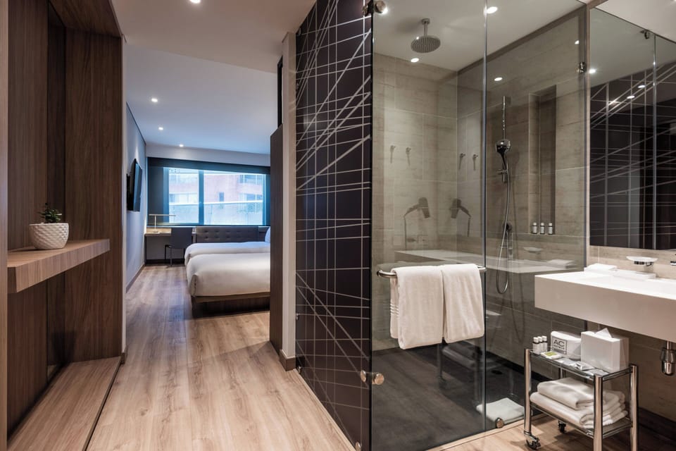 Deluxe Room, 2 Double Beds | Individually furnished, desk, laptop workspace, iron/ironing board