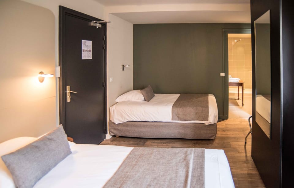 Triple Room | Premium bedding, down comforters, desk, blackout drapes