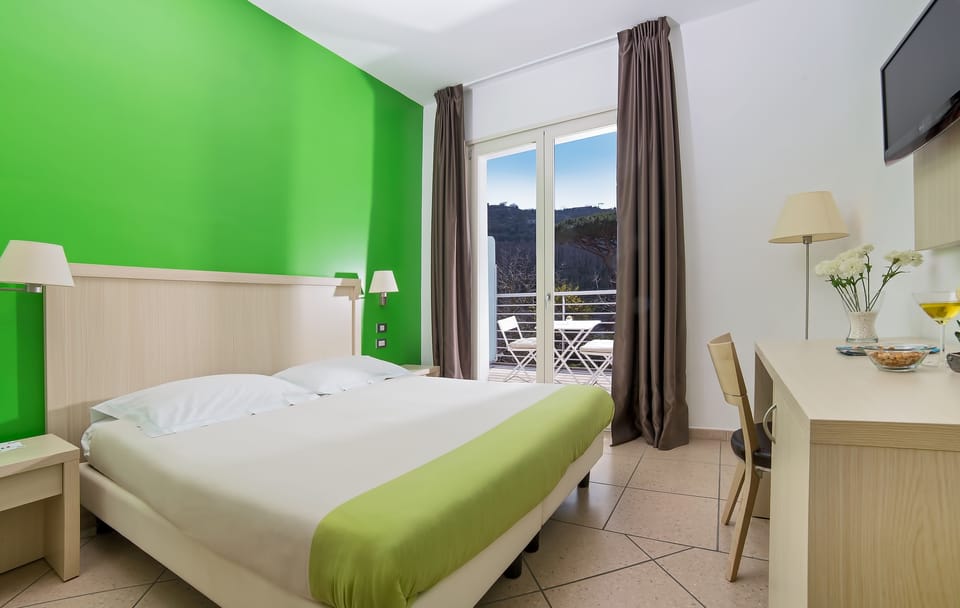 Double or Twin Room | Minibar, in-room safe, desk, iron/ironing board (on request)