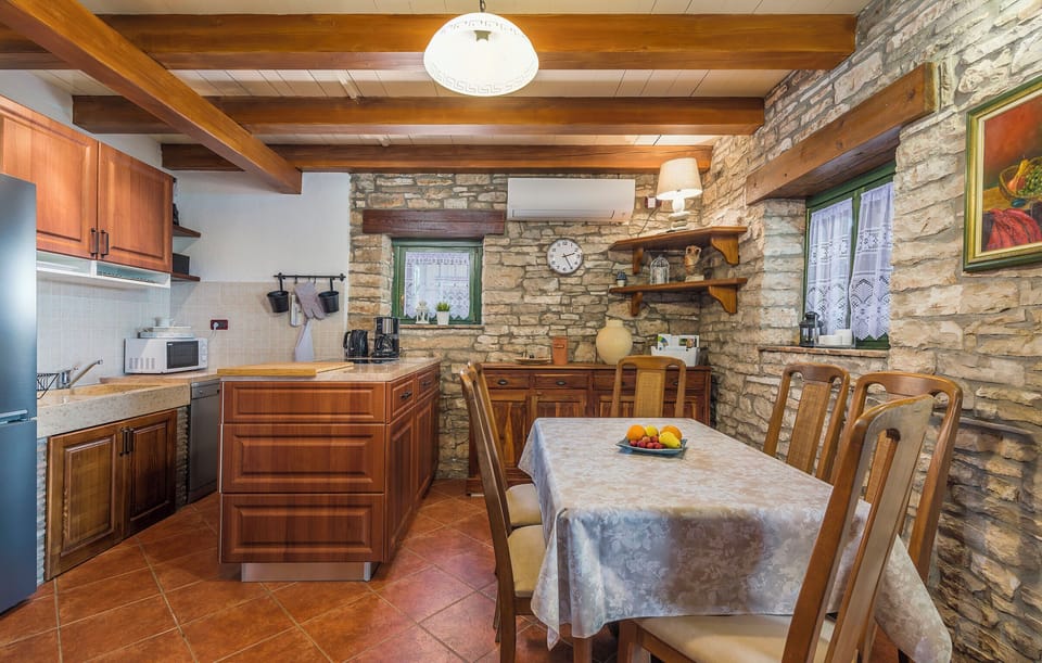 Villa | Private kitchen | Fridge, microwave, oven, stovetop