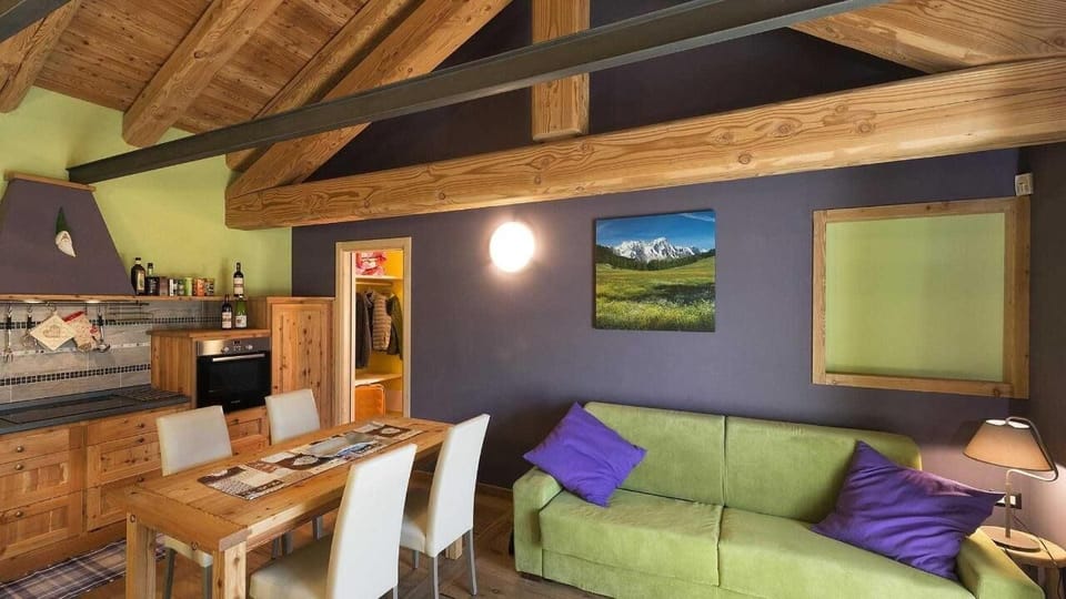 Apartment, 1 Bedroom (Il Melo) | Living area | LED TV, heated floors