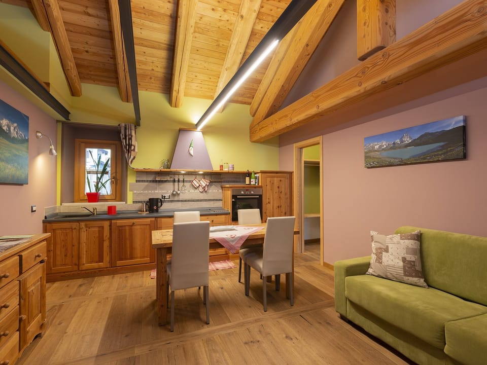 Apartment, 1 Bedroom (Il Melo) | Living area | LED TV, heated floors