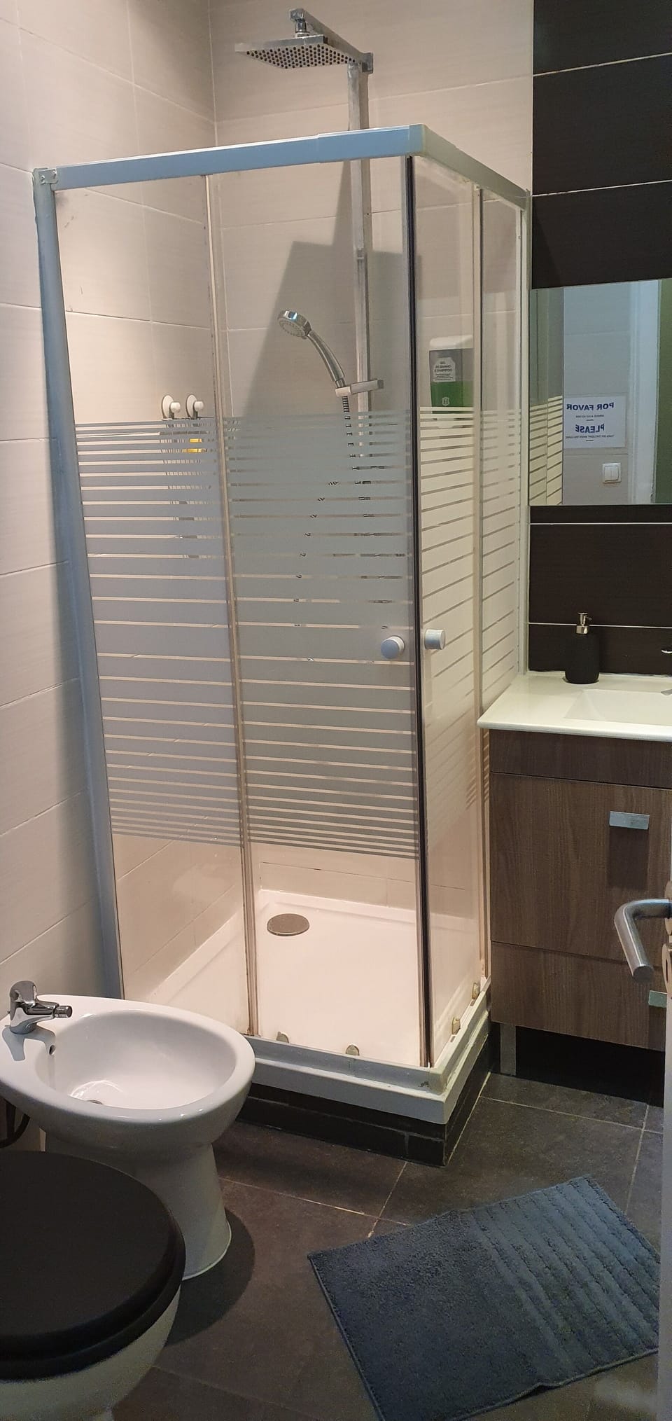 Shower, rainfall showerhead, hair dryer, towels