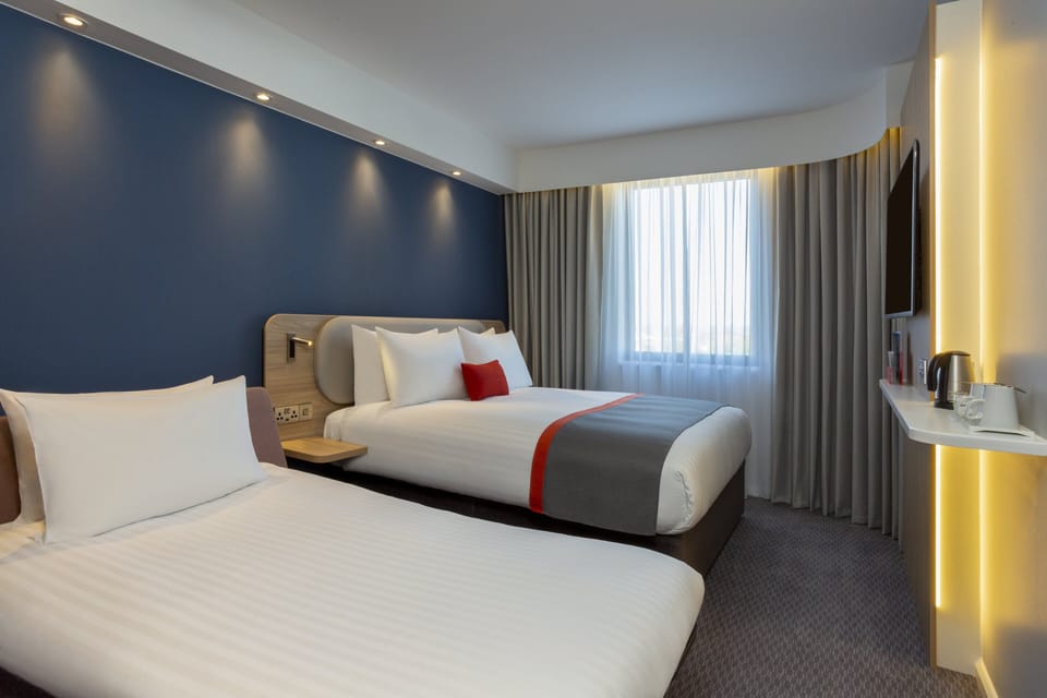 Hypo-allergenic bedding, blackout drapes, iron/ironing board, free WiFi