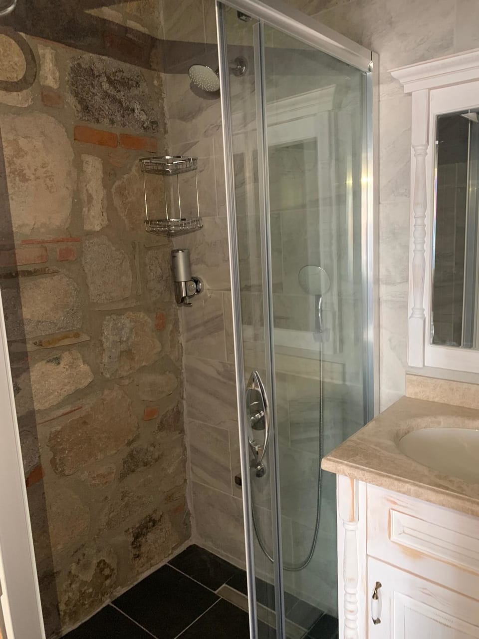 Shower, hair dryer, slippers, towels