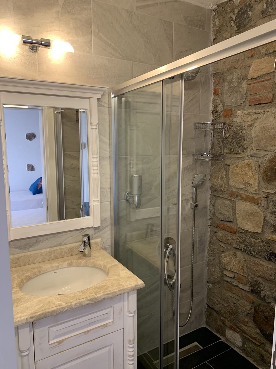 Shower, hair dryer, slippers, towels