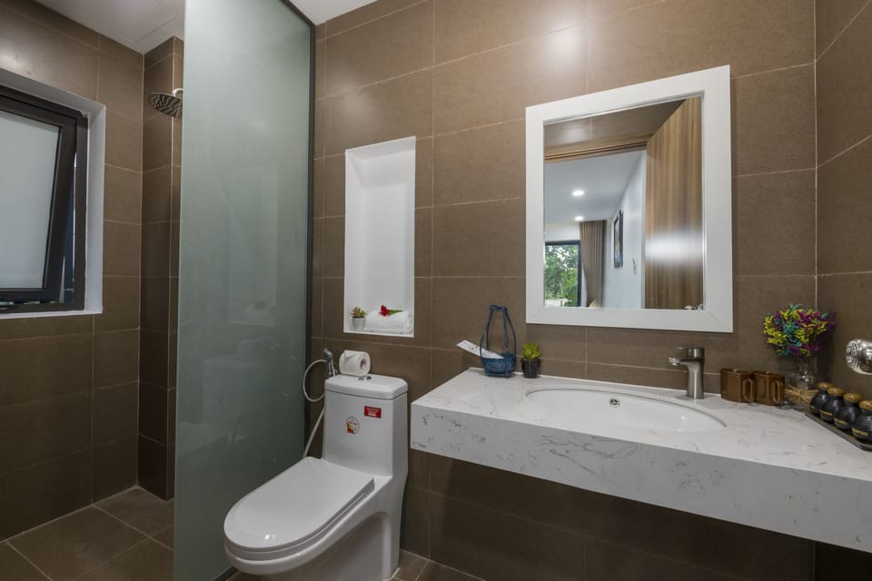 Family Room, City View | Bathroom | Shower, free toiletries, hair dryer, slippers
