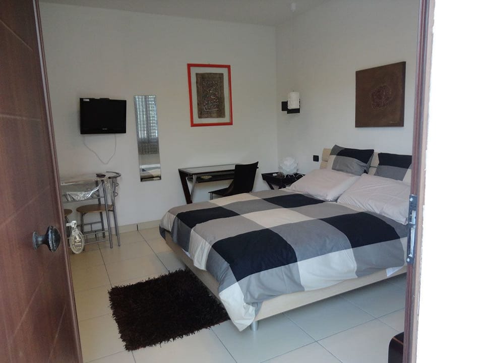 Double or Twin Room | Minibar, in-room safe, individually furnished, blackout drapes