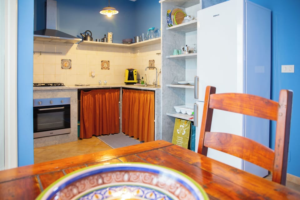 Basic Apartment, 1 Bedroom | Private kitchen | Full-size fridge, microwave, oven, stovetop