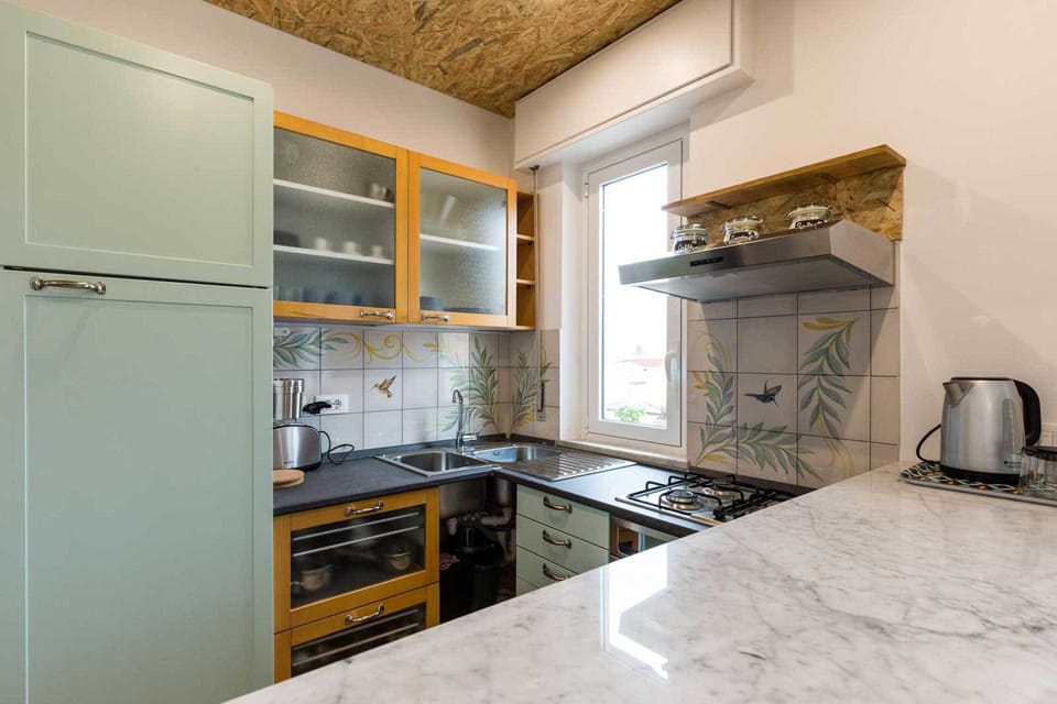 Apartment, 1 Bedroom | Private kitchen | Full-size fridge, oven, stovetop, electric kettle