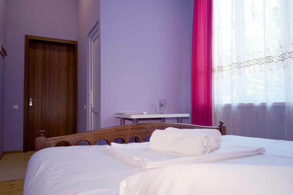 Deluxe Room | Minibar, desk, laptop workspace, blackout drapes