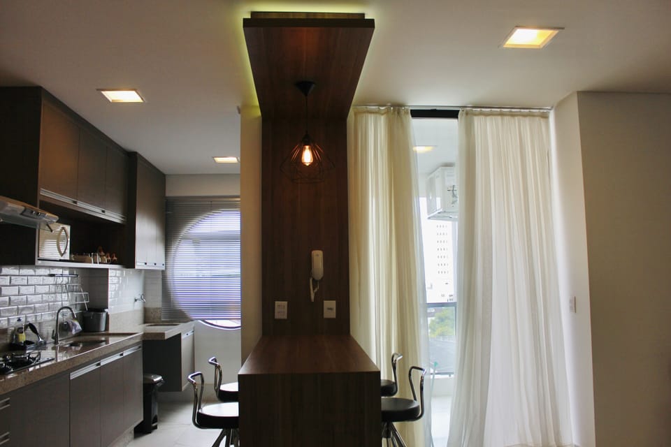 Deluxe Apartment | Private kitchen | Full-size fridge, microwave, oven, blender