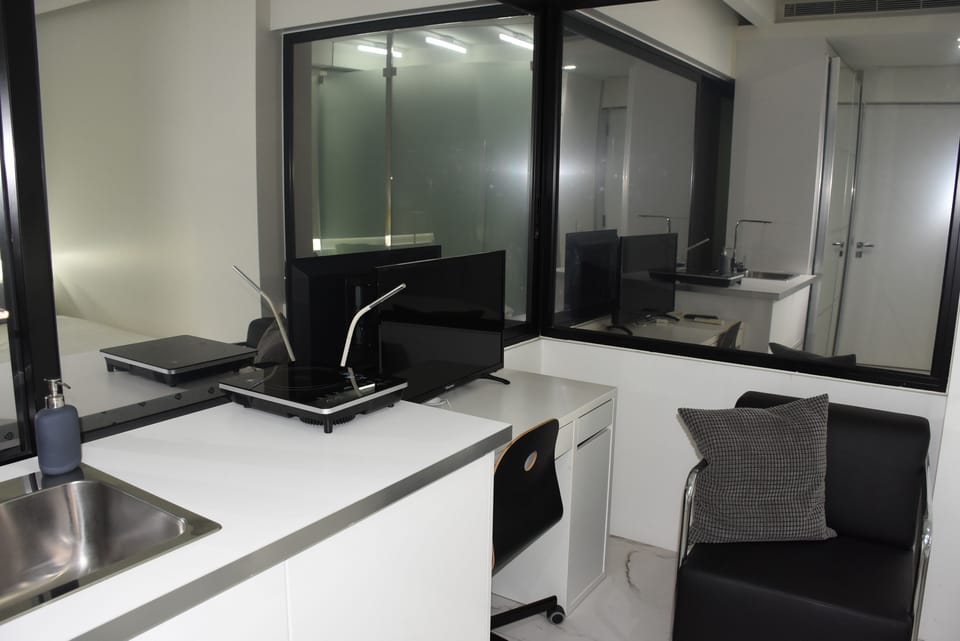 Deluxe Double or Twin Room | Private kitchen | Fridge