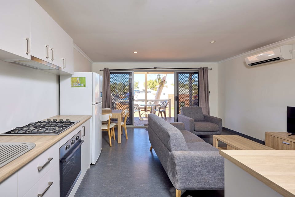 1 Bedroom Cabin | Living area | Flat-screen TV