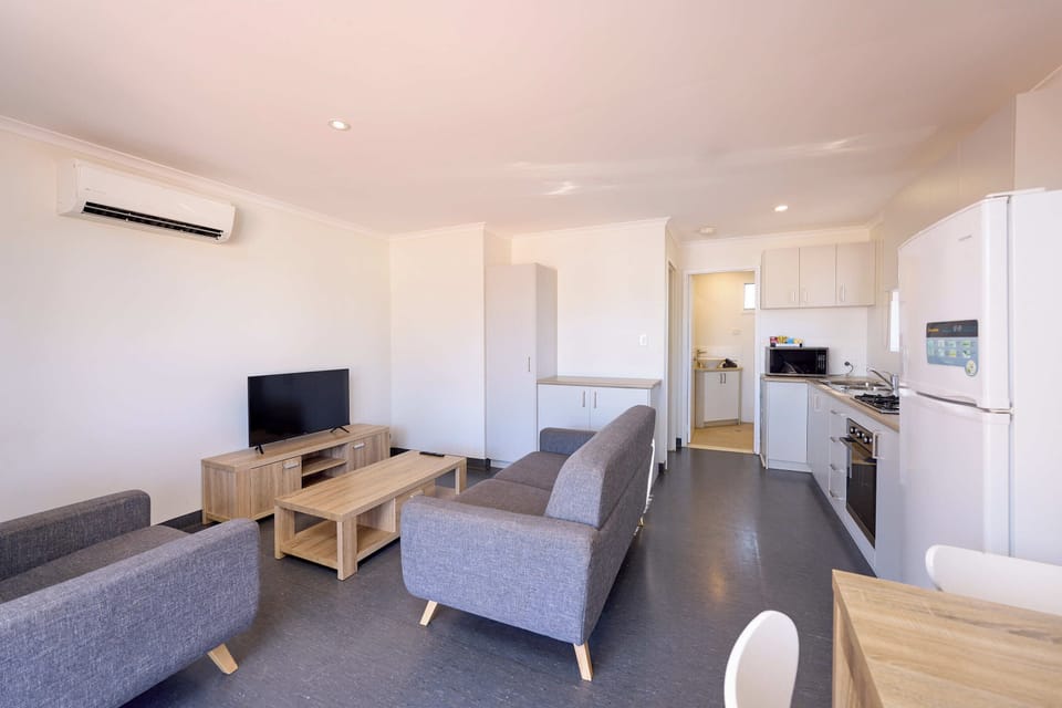 1 Bedroom Cabin | Living area | Flat-screen TV