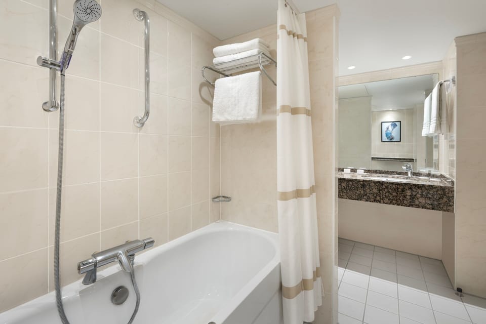 Presidential Suite, 1 Bedroom | Bathroom | Combined shower/tub, free toiletries, hair dryer, towels