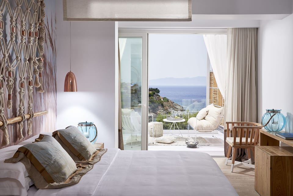 Deluxe Suite, Sea View (1st Floor) | 1 bedroom, hypo-allergenic bedding, minibar, in-room safe