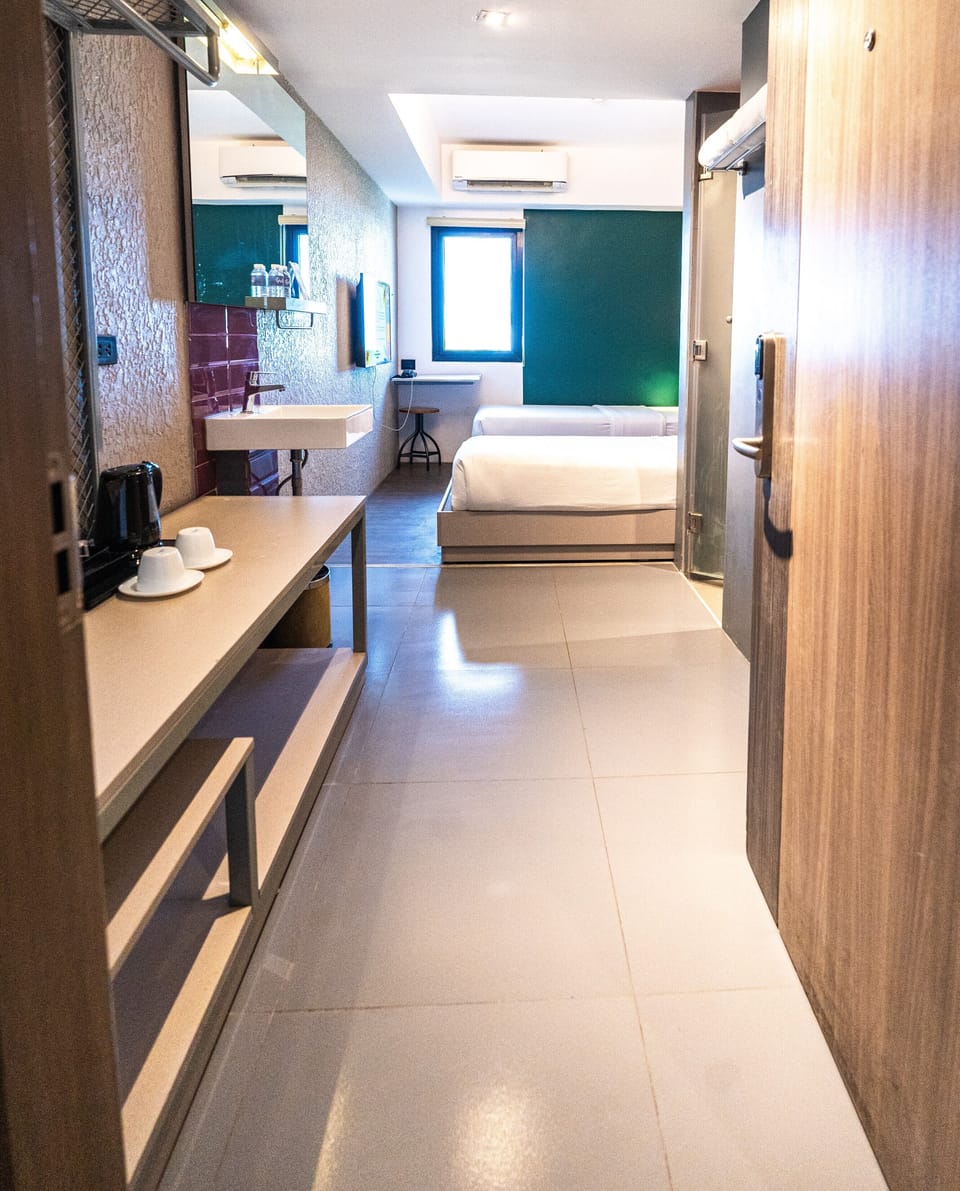 Deluxe Twin Room, 2 Twin Beds | Laptop workspace, blackout drapes, iron/ironing board, free WiFi