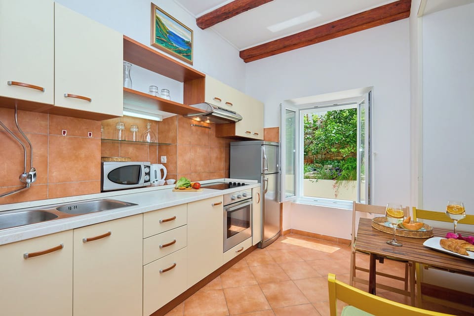 Apartment (2 Bedrooms) | Private kitchen | Coffee/tea maker, full-size fridge, microwave, oven