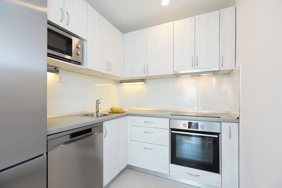Apartment (2 Bedrooms) | Private kitchen | Coffee/tea maker, full-size fridge, microwave, oven