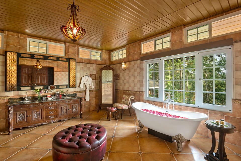 Separate tub and shower, hair dryer, bathrobes, slippers