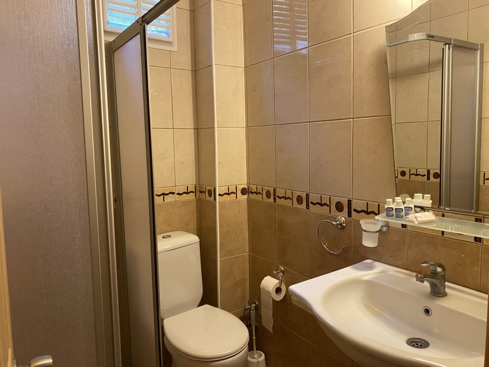 Shower, free toiletries, hair dryer, towels
