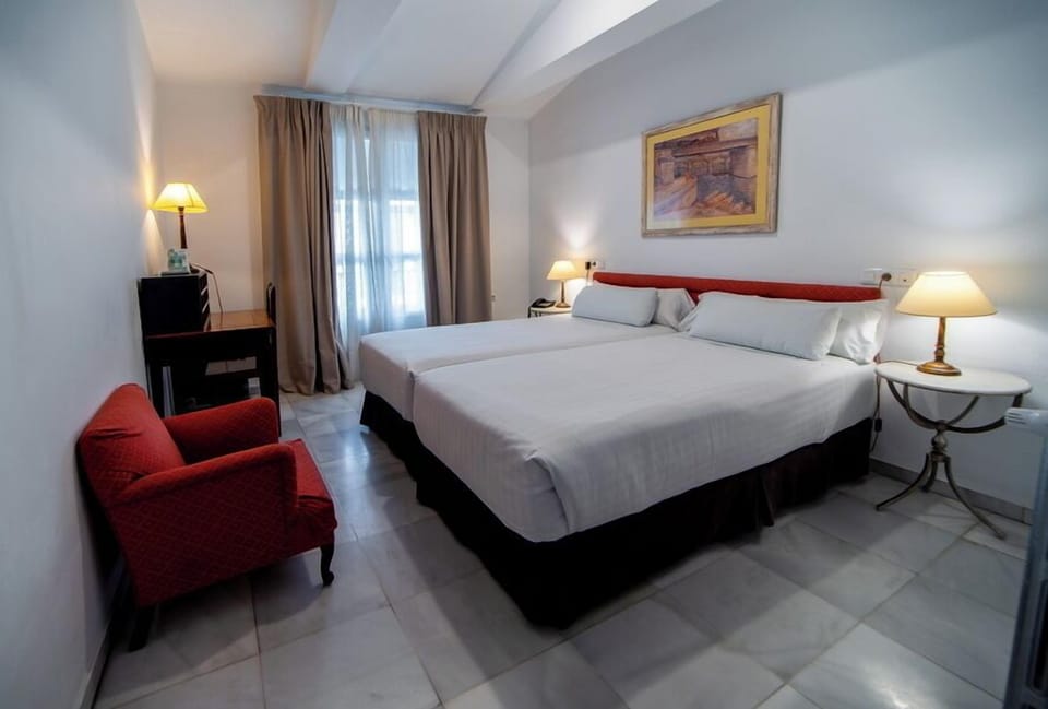 Standard Double or Twin Room (Balcony) | Down comforters, desk, iron/ironing board, free WiFi