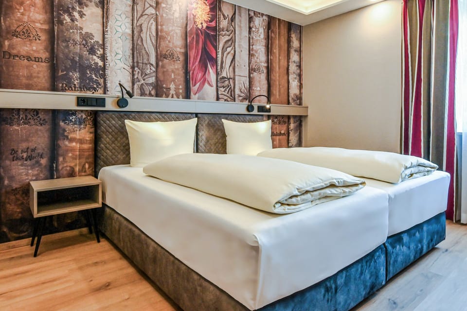 Basic Double Room | In-room safe, individually decorated, desk, laptop workspace
