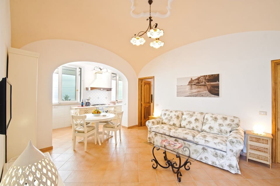Apartment, 1 Bedroom | Living area | Flat-screen TV