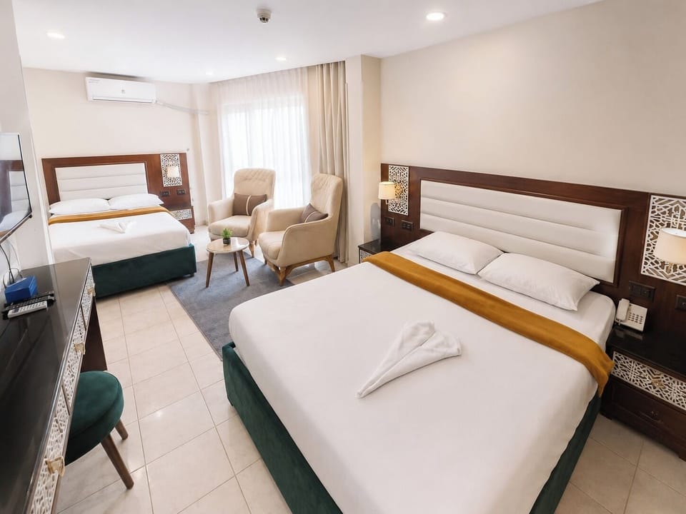 Deluxe Triple Room | Premium bedding, minibar, blackout drapes, free WiFi