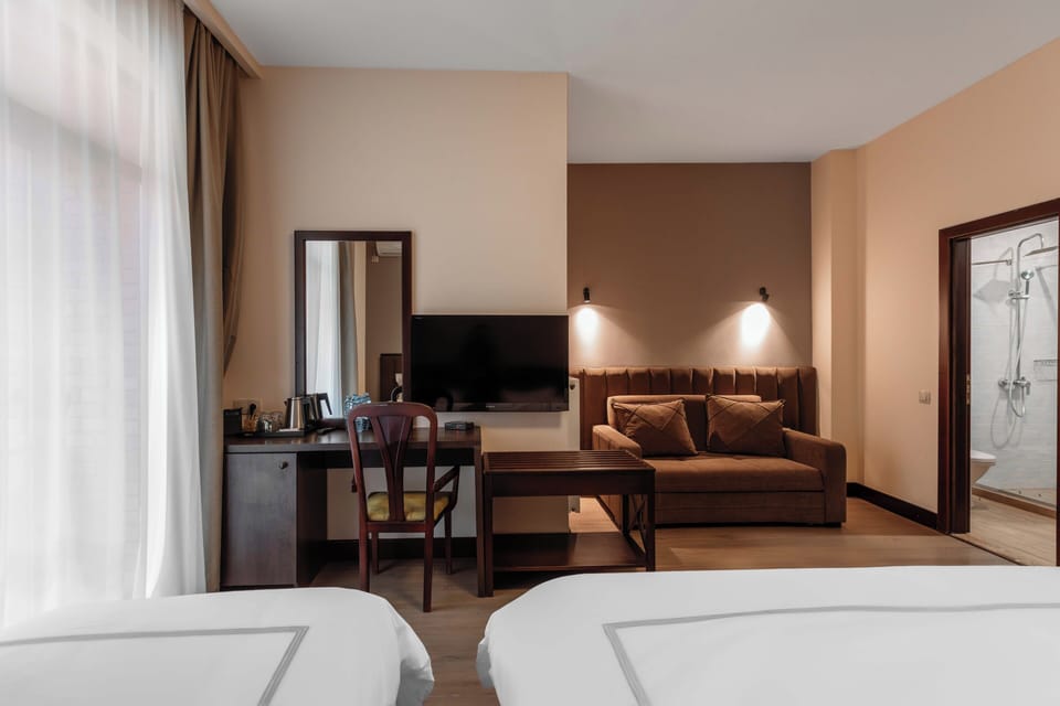 Family Quadruple Room, Multiple Beds, Non Smoking, Garden View | Premium bedding, memory foam beds, minibar, in-room safe