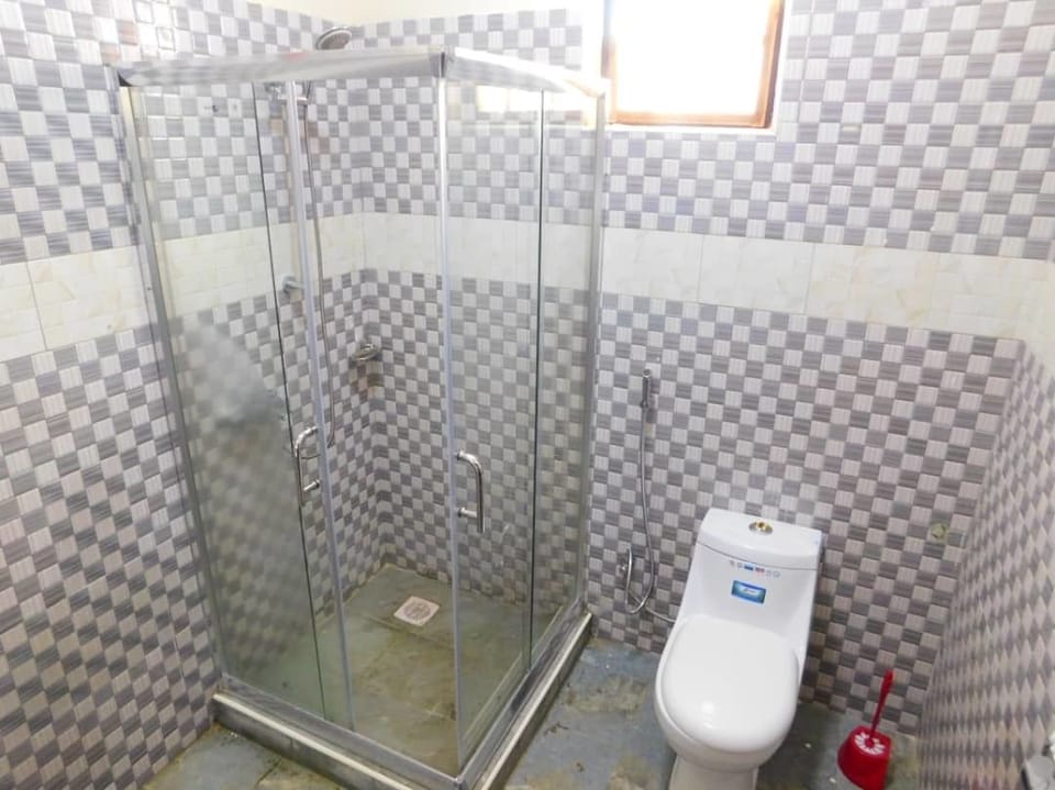 Shower, free toiletries, slippers, towels