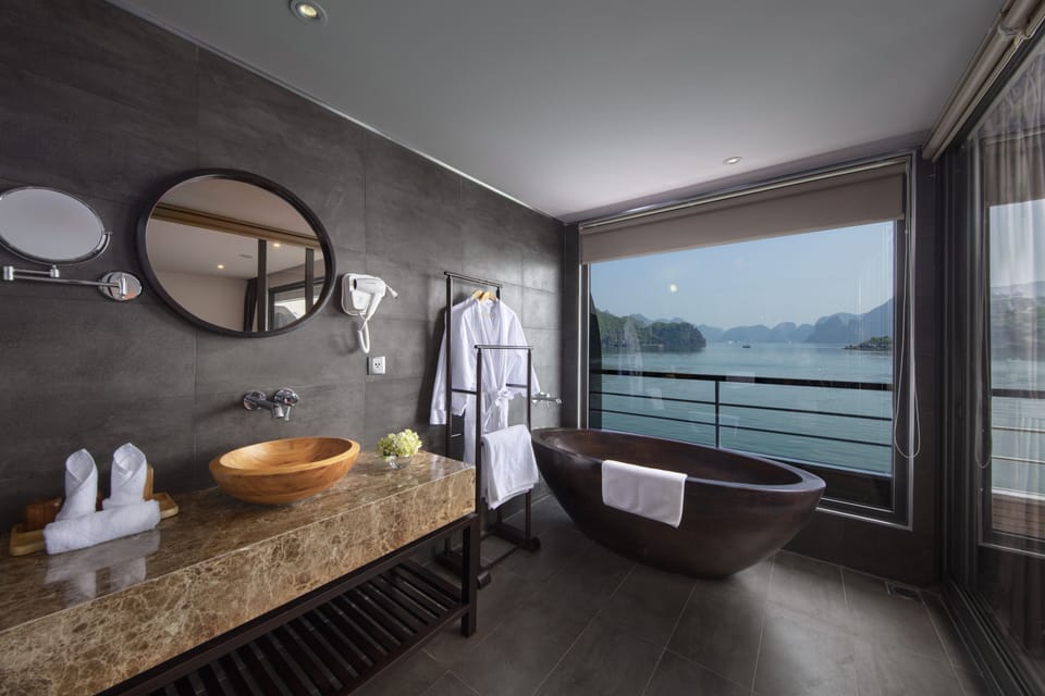 Golden Suite with Balcony | Bathroom | Rainfall showerhead, free toiletries, hair dryer, bathrobes