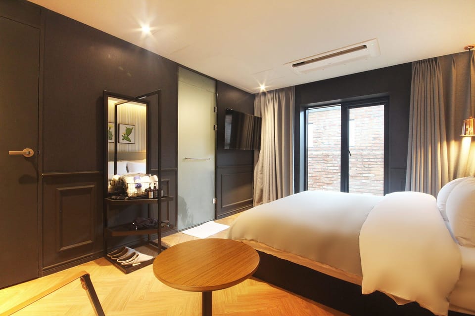 Deluxe Double Room, Terrace | Blackout drapes, soundproofing, iron/ironing board, free WiFi