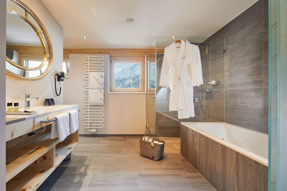 Junior Suite, Balcony | Bathroom | Hair dryer, bathrobes, slippers, towels