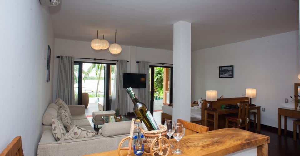 Suite, River View | Down comforters, minibar, in-room safe, individually decorated