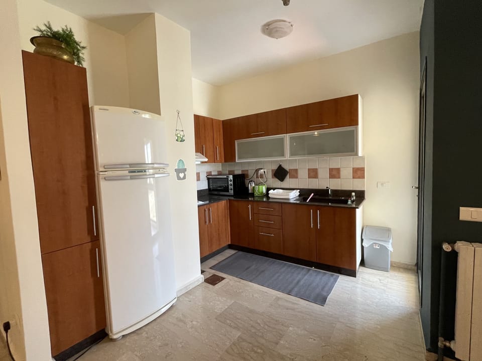 Luxury Chalet, 3 Bedrooms, Fireplace | Private kitchen | Full-size fridge, stovetop, cookware/dishes/utensils, cleaning supplies