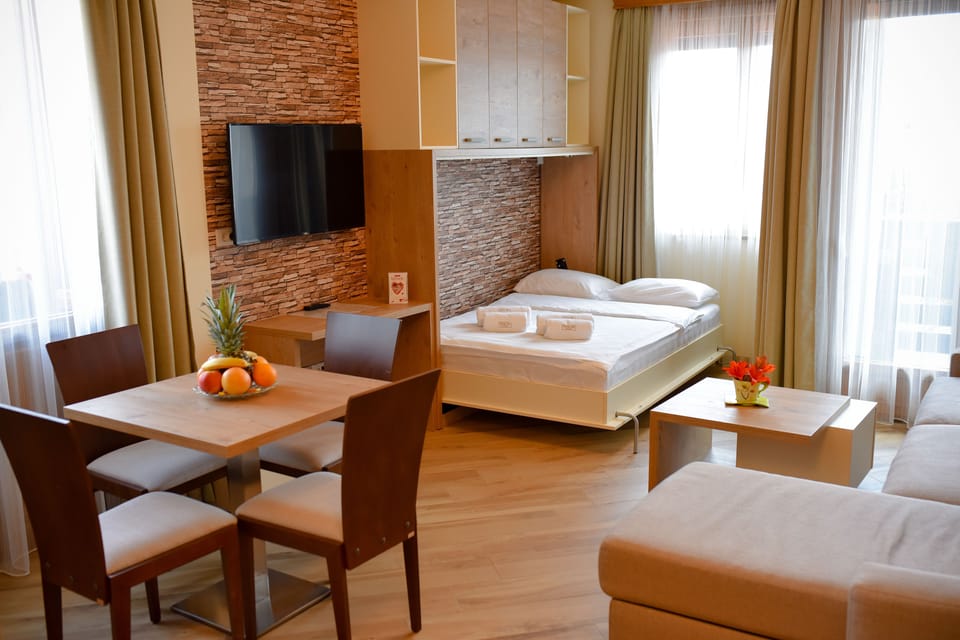 City Studio | Desk, blackout drapes, soundproofing, free cribs/infant beds