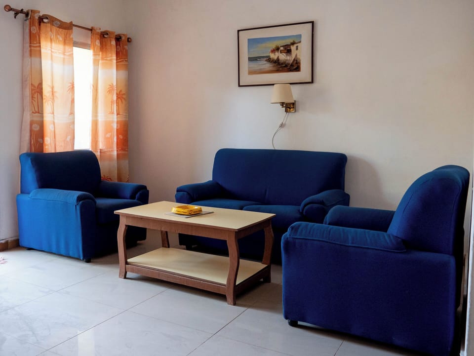 Apartment, 1 Bedroom | Living area | Flat-screen TV