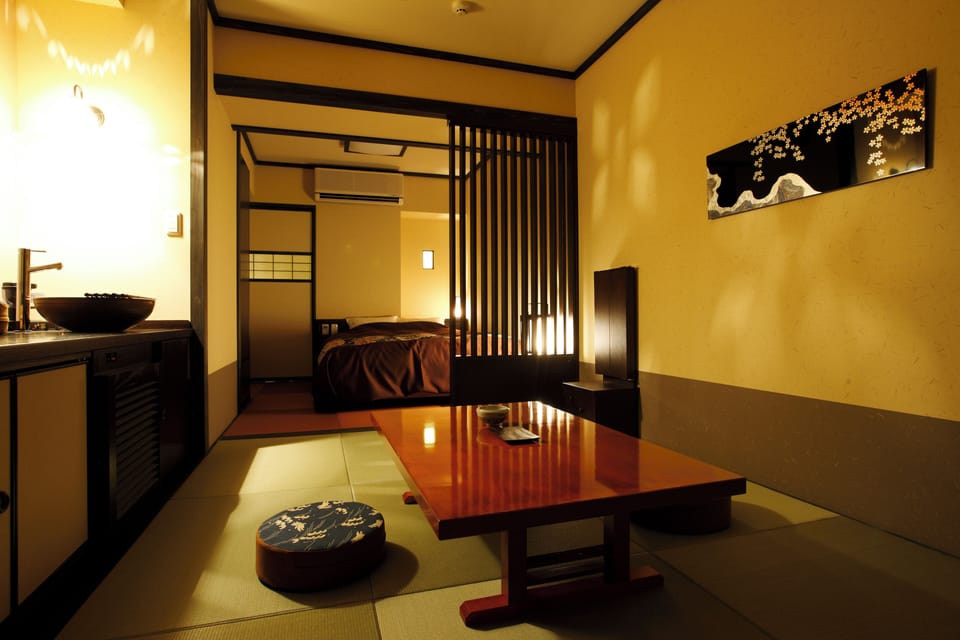 Family Room | In-room safe, desk, blackout drapes, iron/ironing board