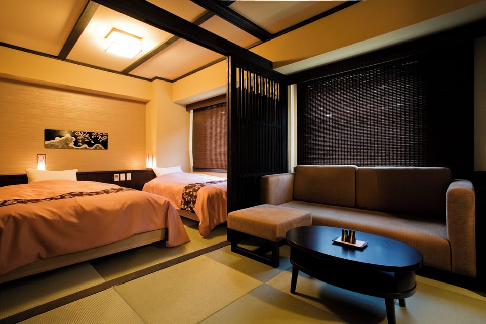Deluxe Twin Room, Non Smoking | In-room safe, desk, blackout drapes, iron/ironing board