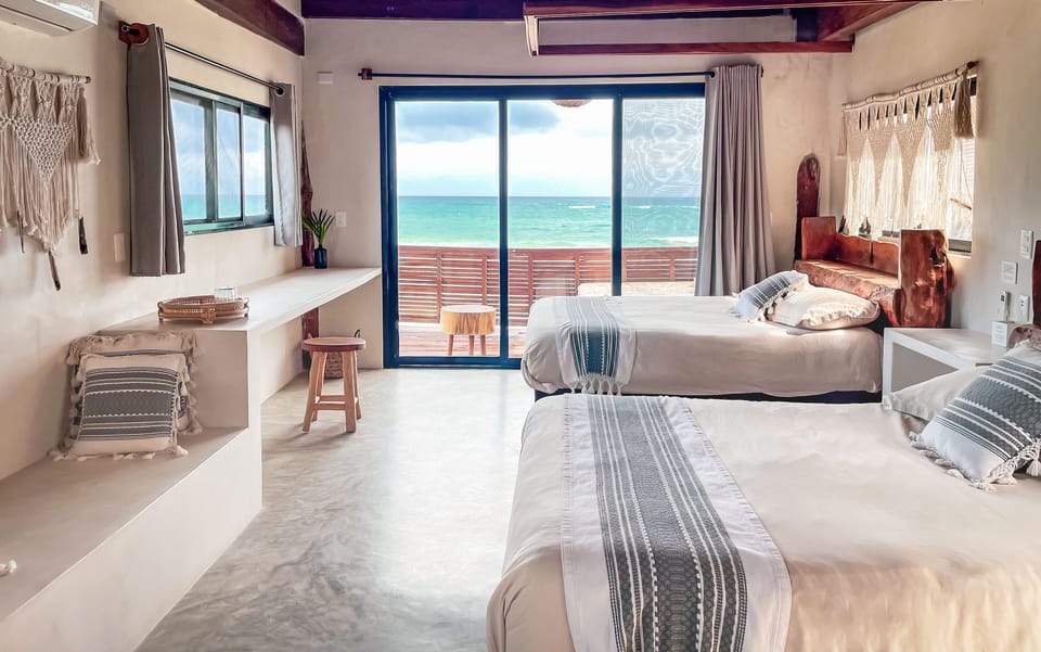 Double Room with Beachfront view (with two beds) | In-room safe, WiFi, bed sheets