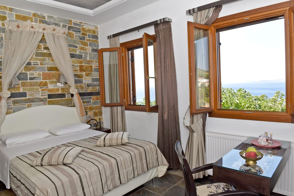 Standard Room, Sea View | Living area | TV