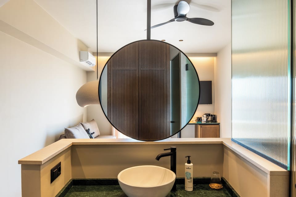Shower, rainfall showerhead, hair dryer, towels