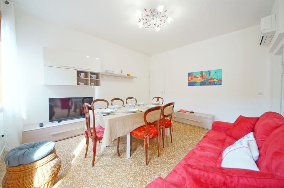 Apartment, 3 Bedrooms | Living area | Flat-screen TV